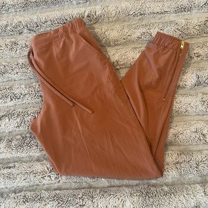 Albion Fit Rouge (salmon) color Jetsetters size XS